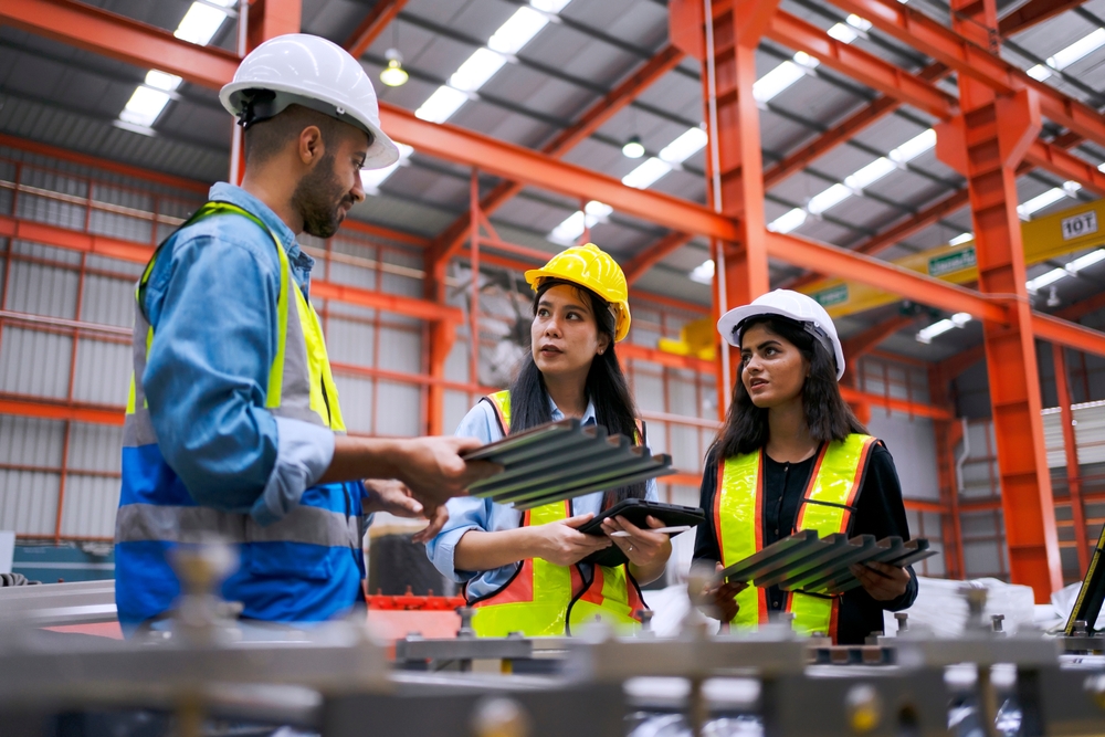 Worker At Metal Sheet Factory